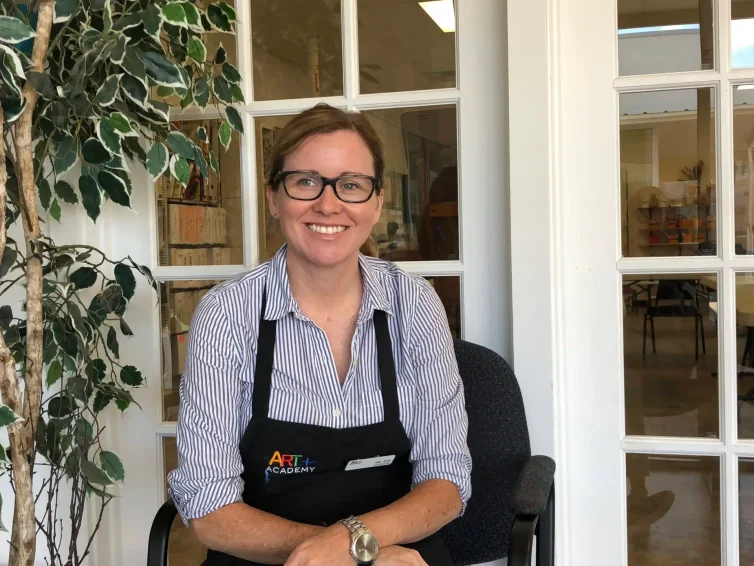 Portrait of an art teacher at Austin art school, highlighting professionalism and dedication to student learning