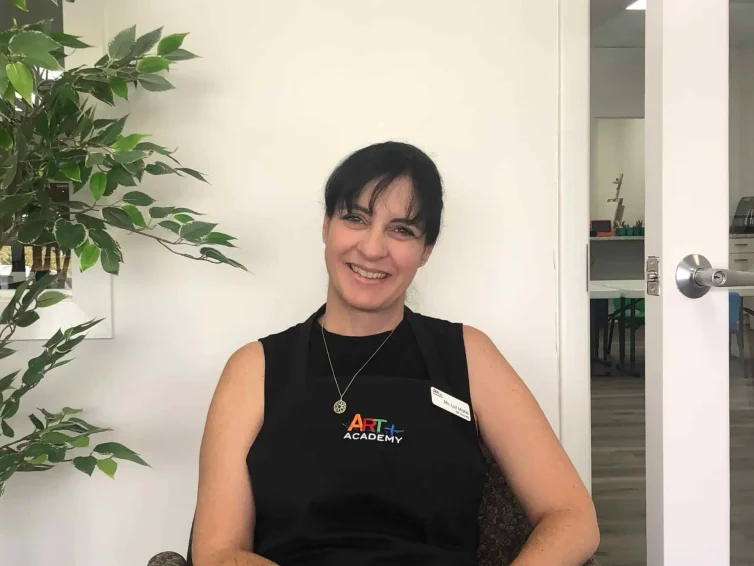 Portrait of an art teacher at Austin art school, highlighting professionalism and dedication to student learning