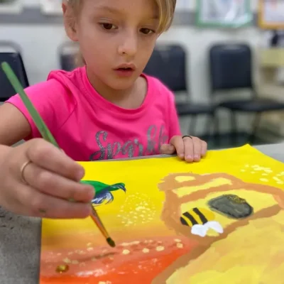 Art_student_age_6_adding_texture_to_art_project